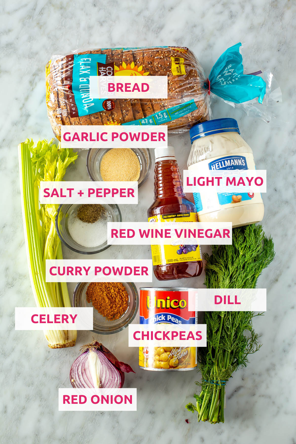 Ingredients for chickpea tuna salad sandwich: bread, chickpeas, salt, pepper, dill, celery, curry powder, garlic powder, red onion, light mayo and red wine vinegar.