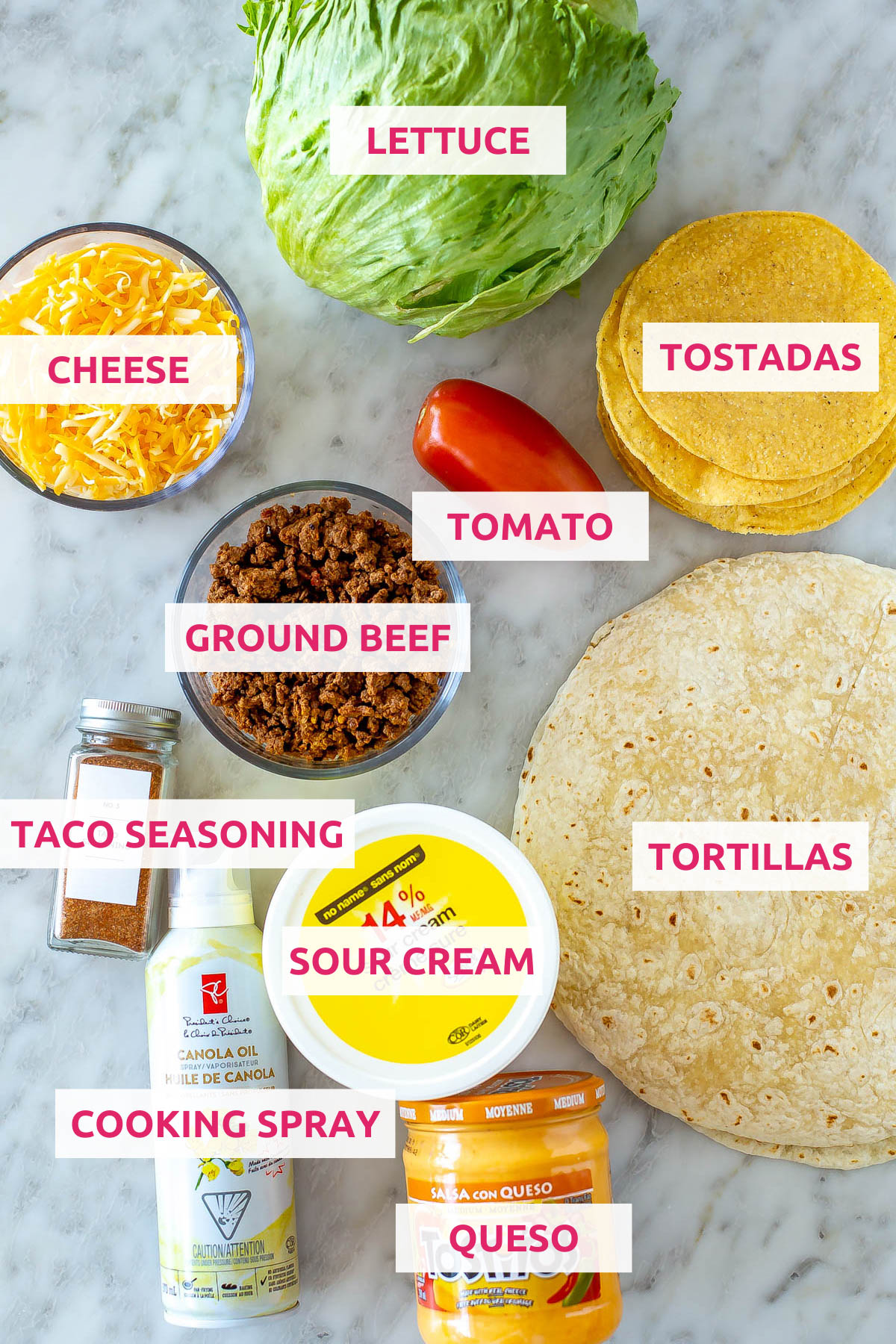 Ingredients for copycat crunchwrap supreme: lettuce, tostadas, tortillas, queso, cooking spray, sour cream, taco seasoning, ground beef, cheese and tomato.