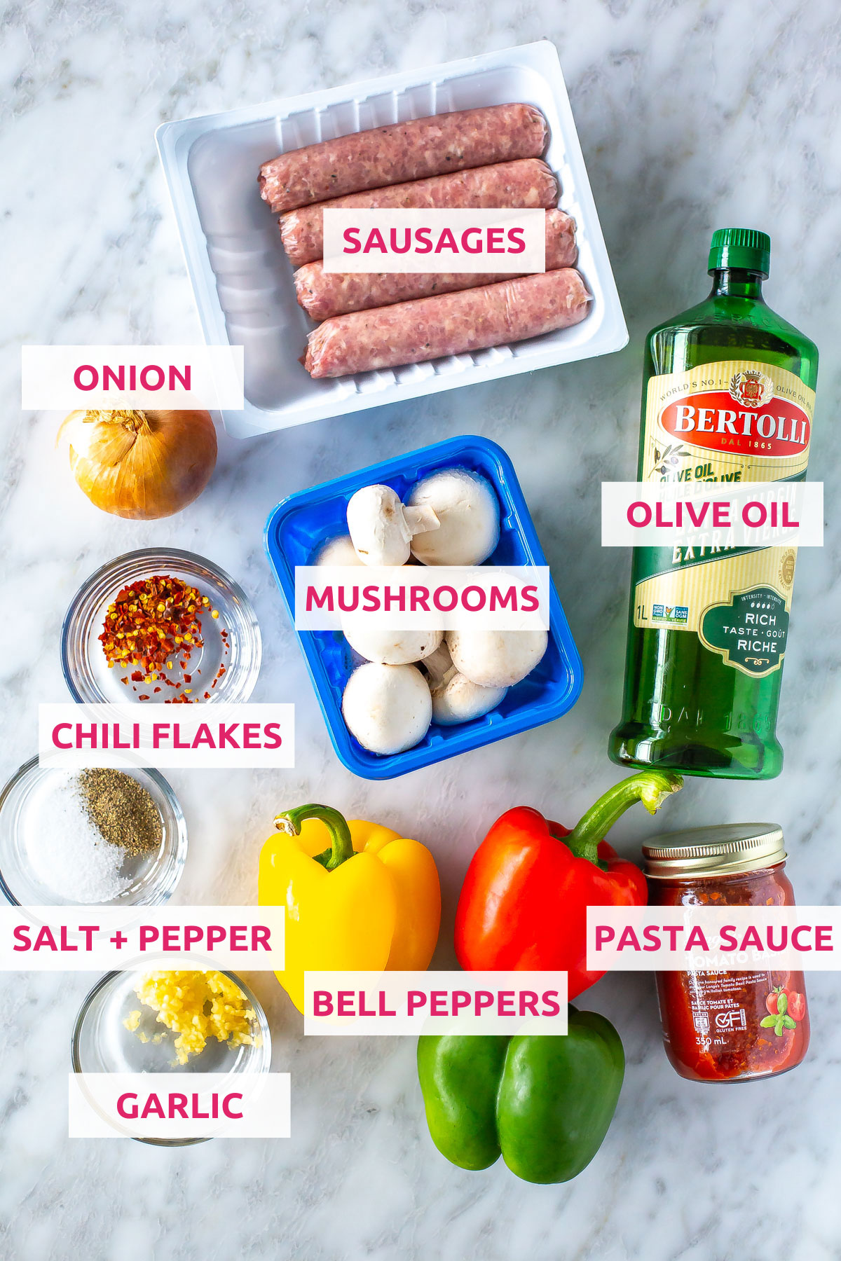 Ingredients for sausage, peppers and onions: sausages, olive oil, mushrooms, onion, bell peppers, chili flakes, garlic, pasta sauce and salt and pepper.