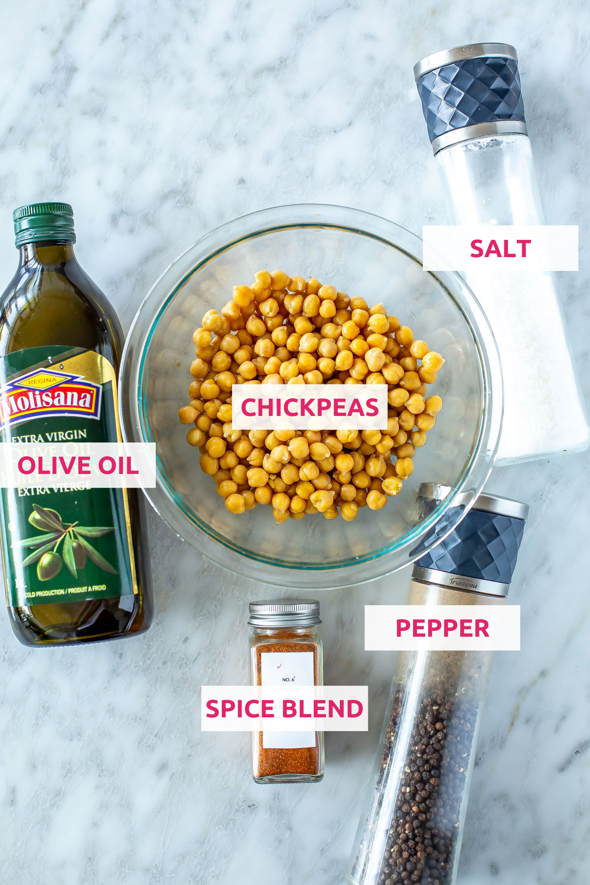 Ingredients for air fryer chickpeas: chickpeas, olive oil, salt, pepper, and a spice blend.