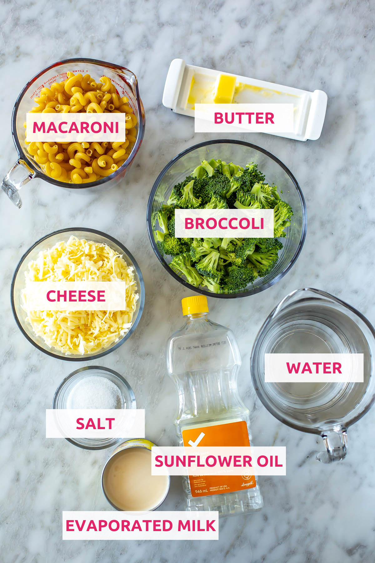 Ingredients for Instant Pot mac and cheese: macaroni, cheese, butter, broccoli, water, salt, evaporated milk and sunflower oil.