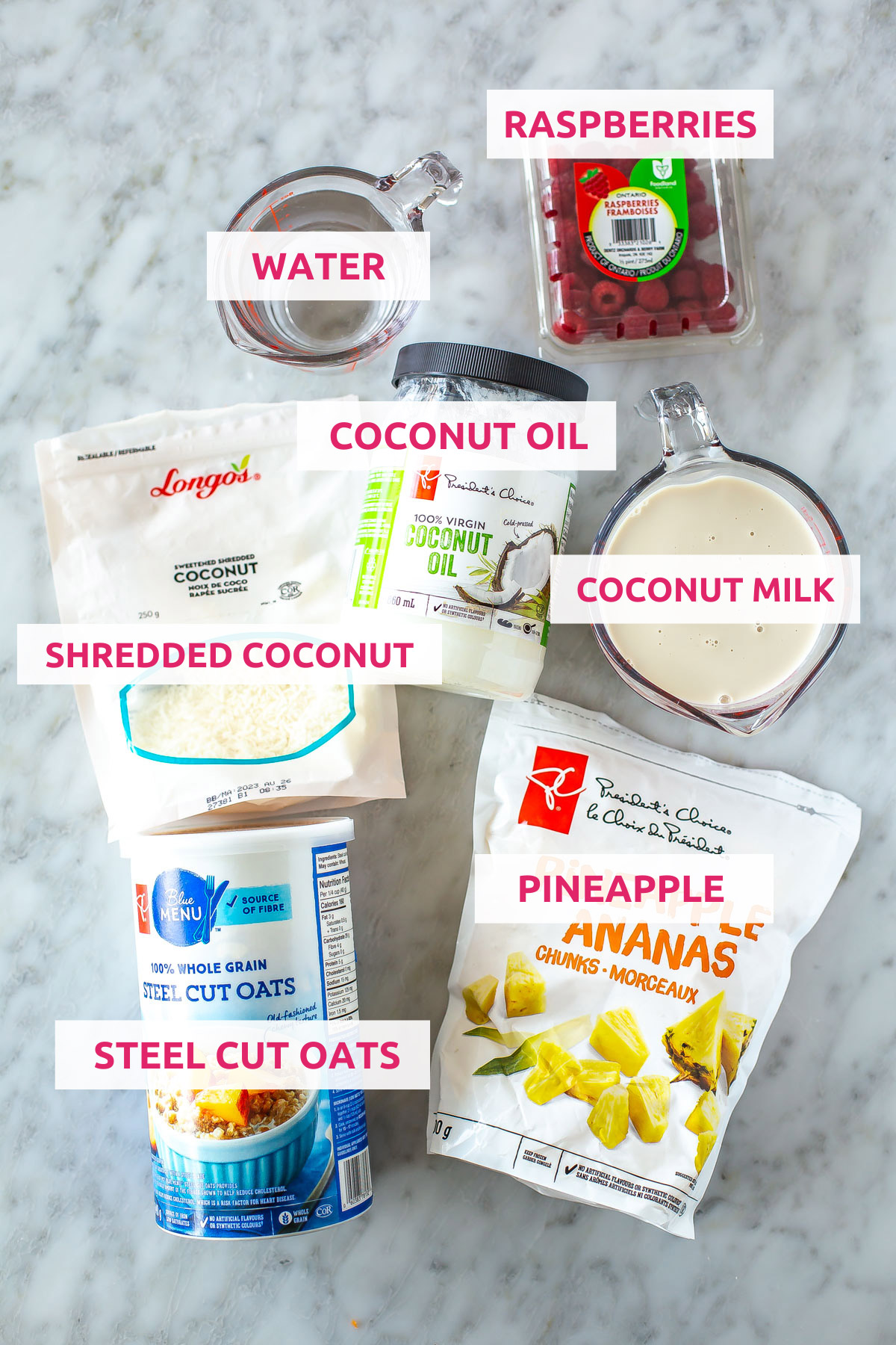 Ingredients for pina colada steel cut oats: steel cut oats, shredded coconut, pineapple, raspberries, coconut milk, coconut oil and water.