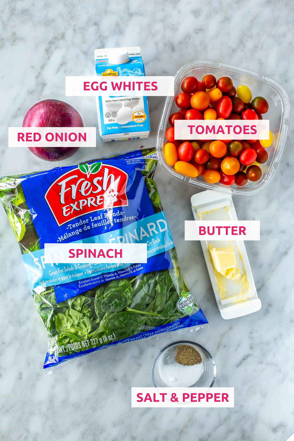 Ingredients for egg white frittata: egg whites, cherry tomatoes, red onion, spinach, butter, salt and pepper.