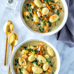Two bowls of copycat Olive Garden Chicken Gnocchi Soup.