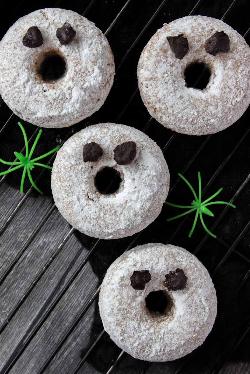 Powdered doughnuts in the shape of ghosts