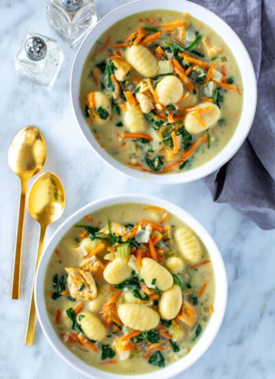 Two bowls of copycat Olive Garden Chicken Gnocchi Soup.