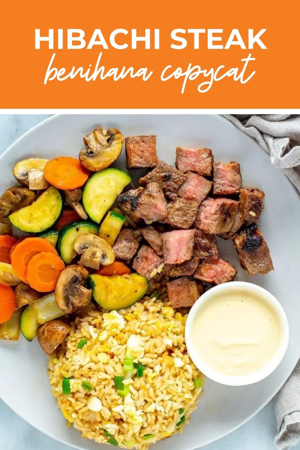 Hibachi steak, fried rice, vegetables and mustard sauce, with text overlay that says 'Hibachi Steak Benihana Copycat'