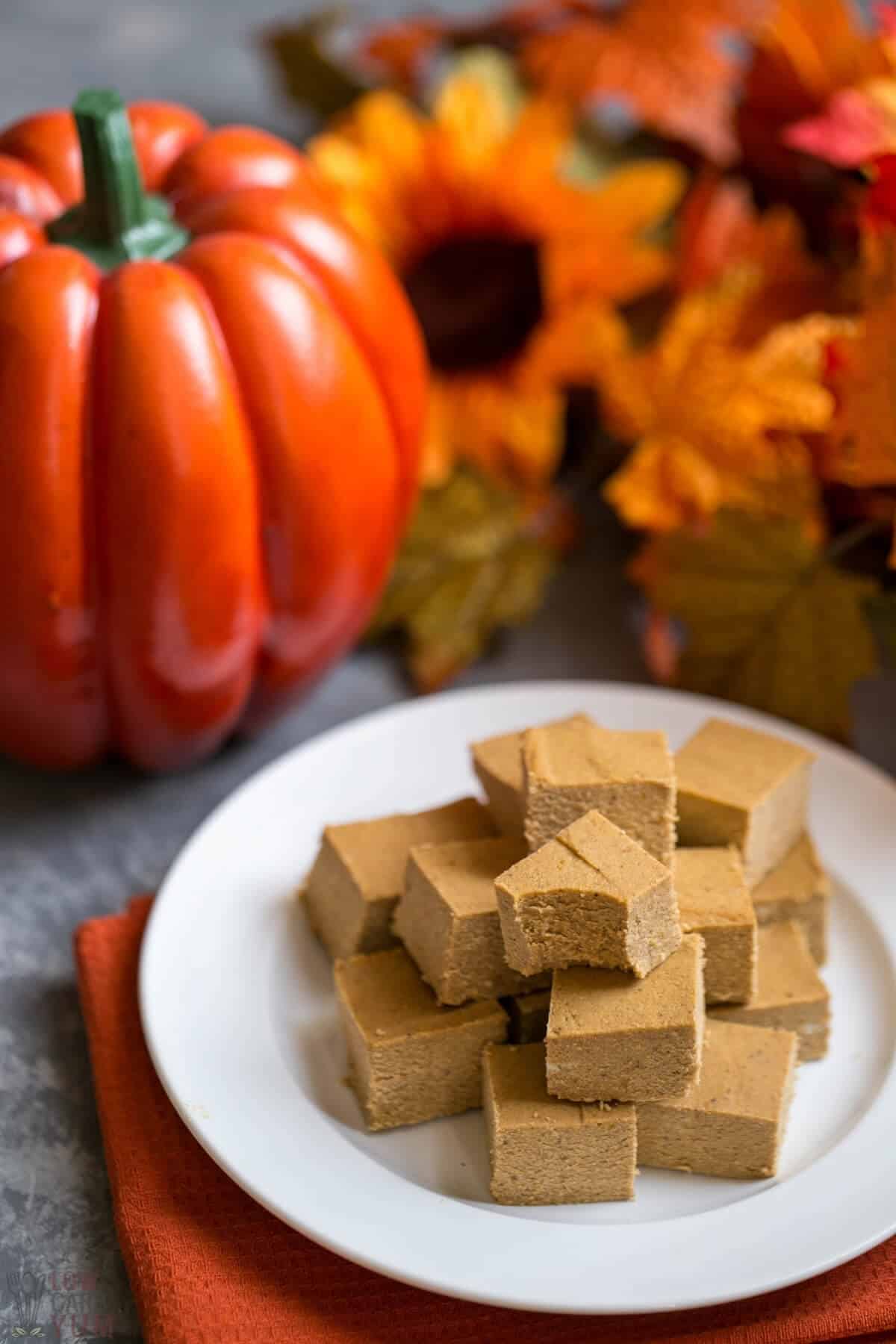 Squares of pumpkin fudge on a plate