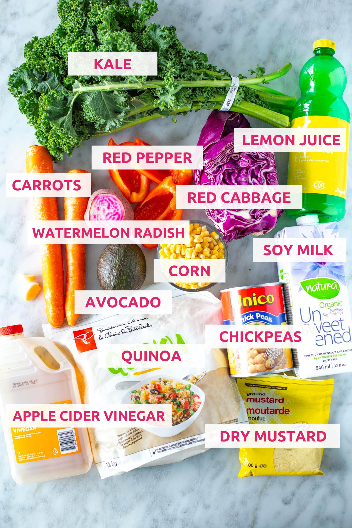 Ingredients for veggie bowls: kale, carrots, red pepper, red cabbage, lemon juice, garlic, avocado, watermelon radish, corn, soy milk, apple cider vinegar, quinoa, chickpeas and dry mustard.