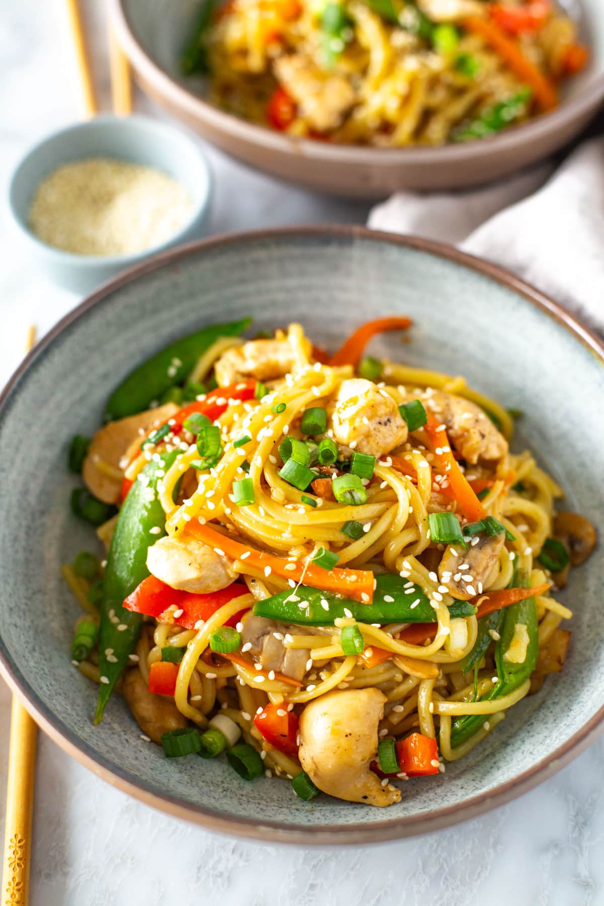 Close-up of chicken lo mein in a bowl