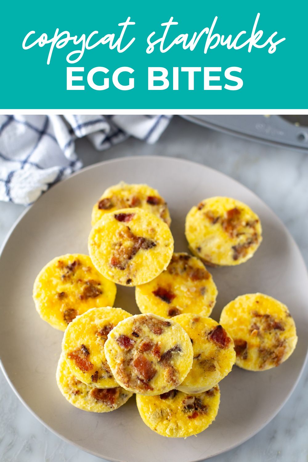 Overhead shot of Starbucks egg bites on a tray with text that says 'Copycat Starbucks Egg Bites'