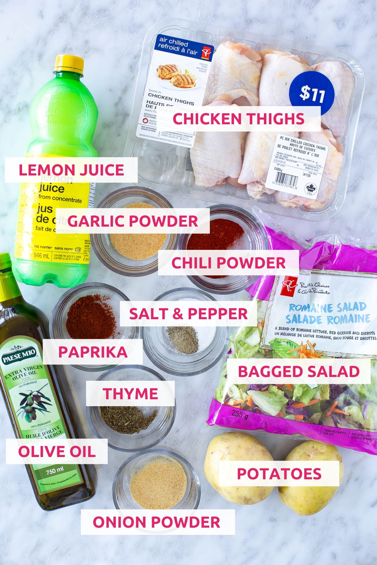 Ingredients for making baked chicken thighs: lemon juice, chicken thighs, garlic powder, chili powder, salt and pepper, paprika, thyme, bagged salad, olive oil, onion powder, potatoes
