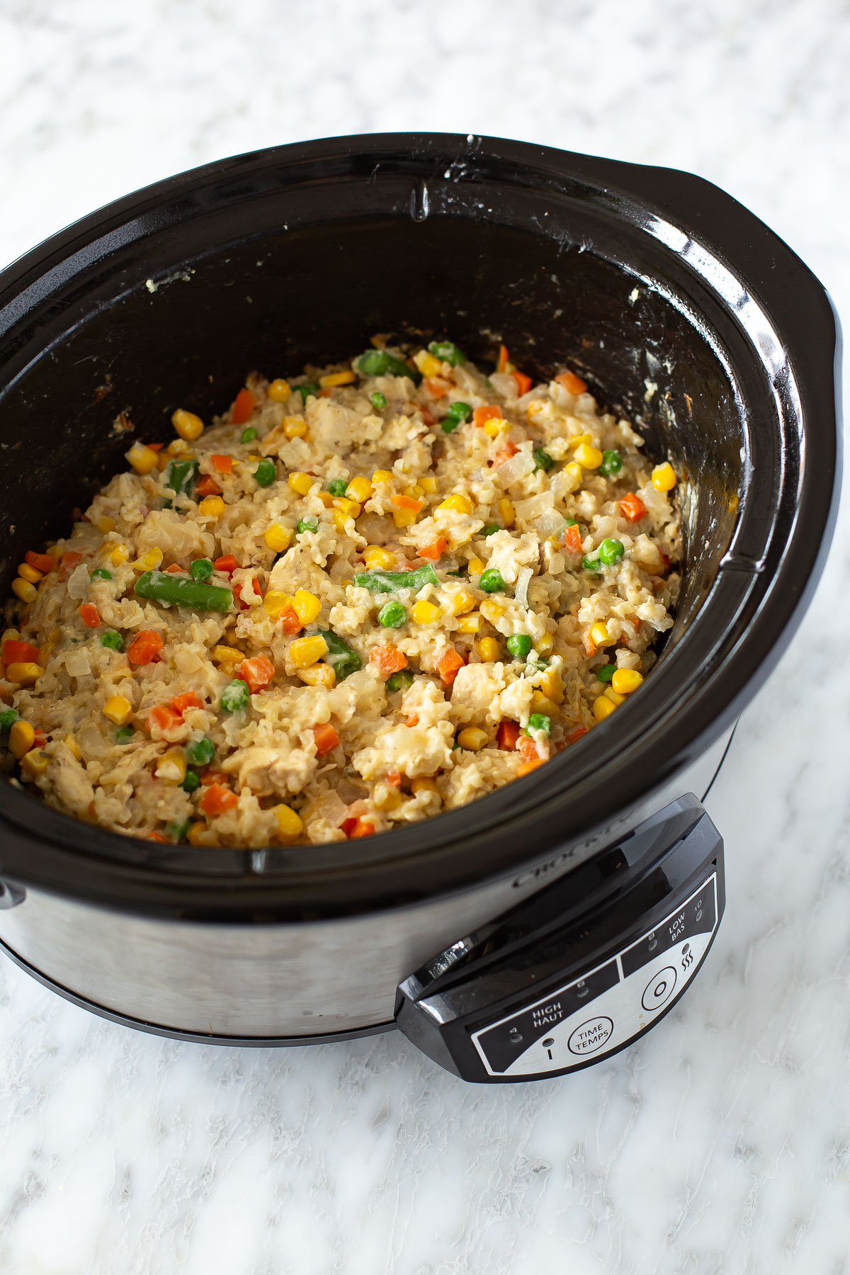 Creamy crockpot chicken and rice in a slow cooker