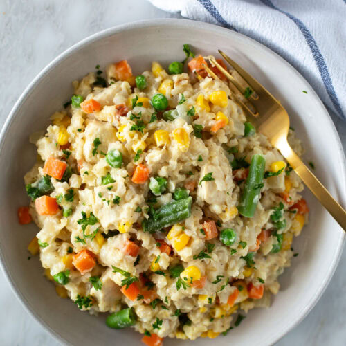 Creamy crockpot chicken and rice in a bowl