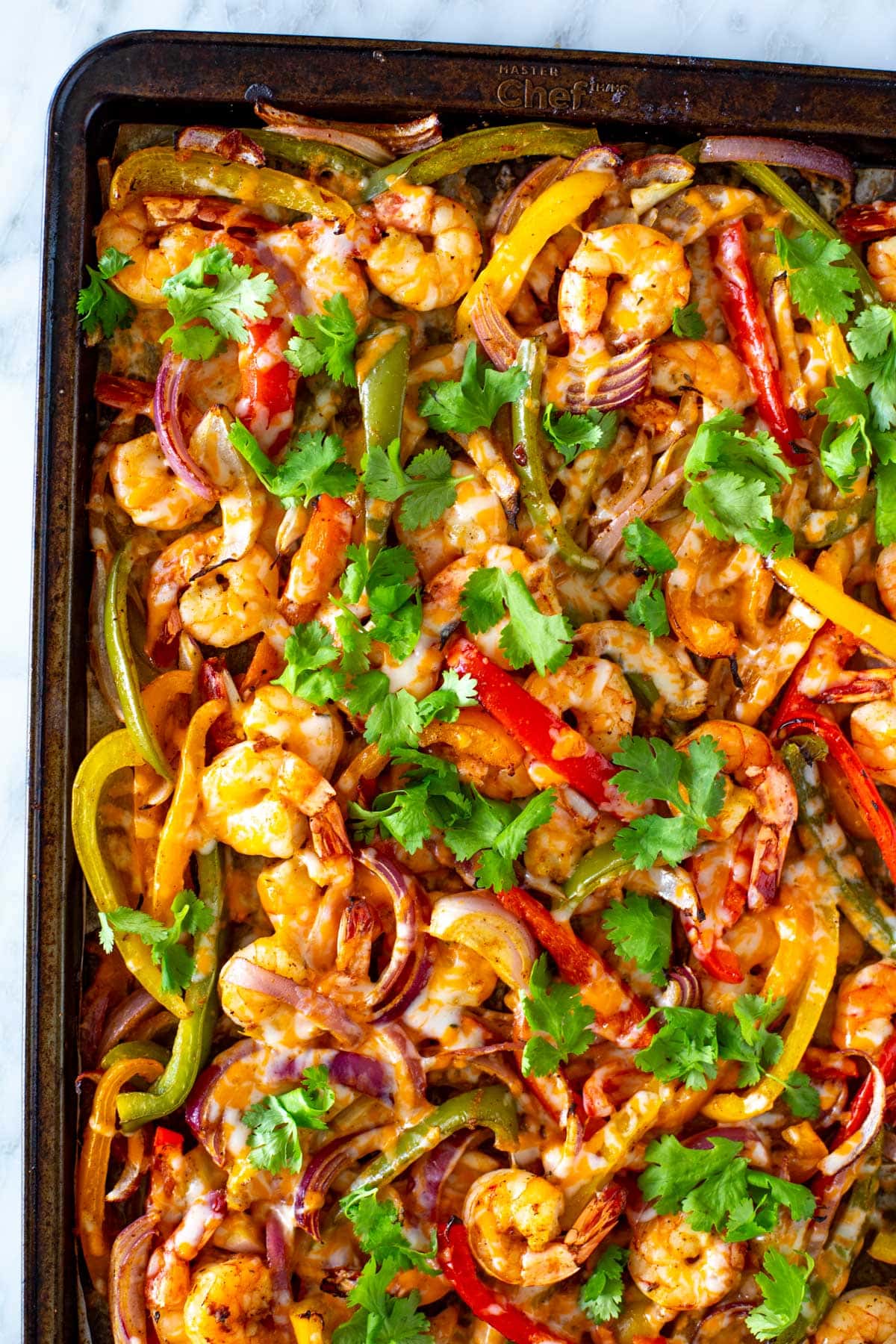 Shrimp fajitas on a sheet pan