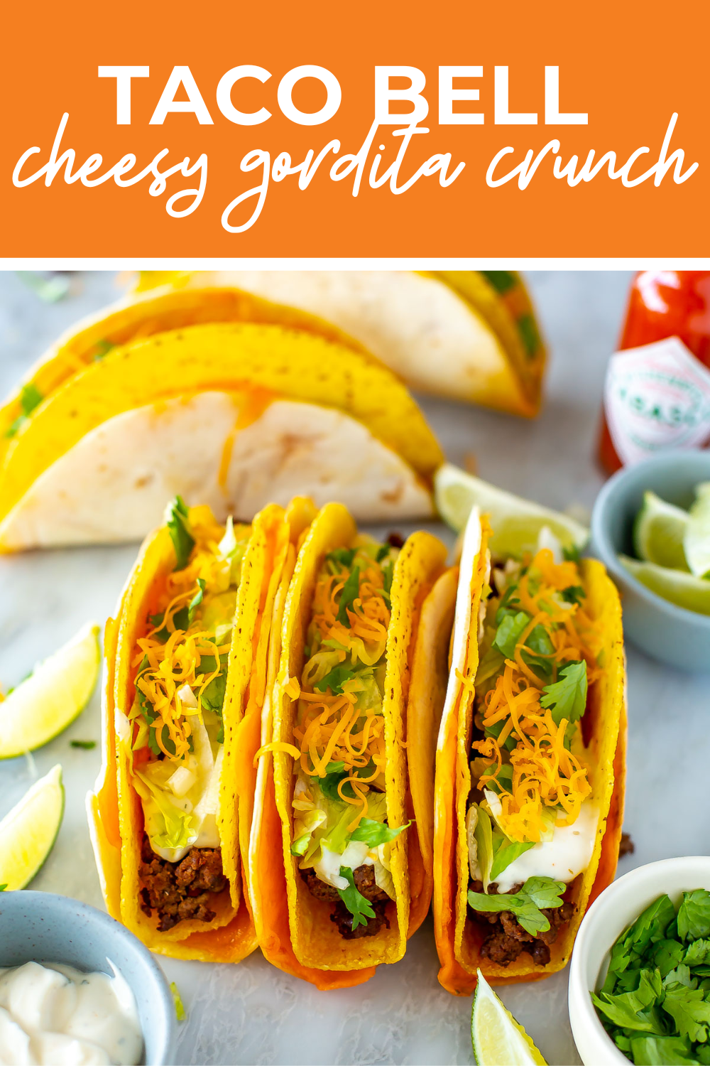 Overhead shot of plated dish with orange banner on the top - reading "taco bell cheesy gordita crunch"