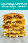 Overhead shot of plated dish with green banner on the top- reading "taco bell copycat crunchwrap supreme"
