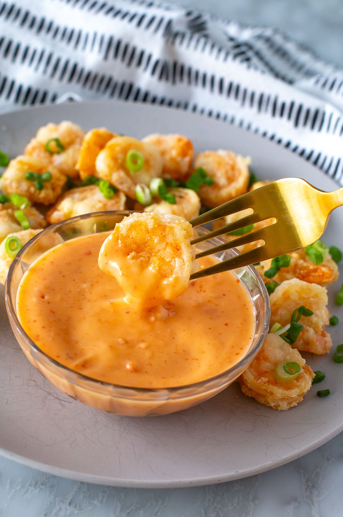 side shot of bang-bang sauce with shrimp 1