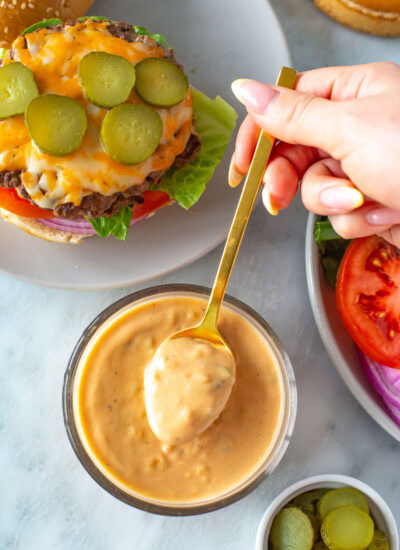 overhead shot of the plated burger and burger sauce to add