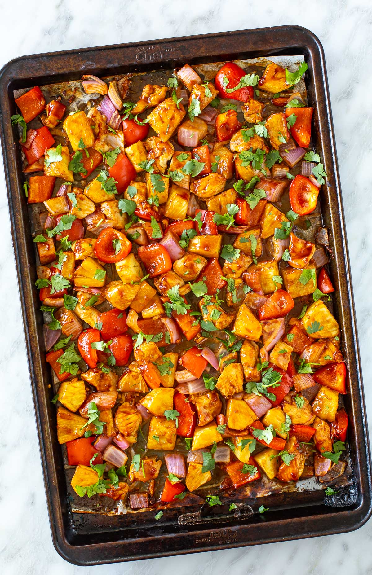 overhead shot of hawaiian chicken in a sheet pan 3