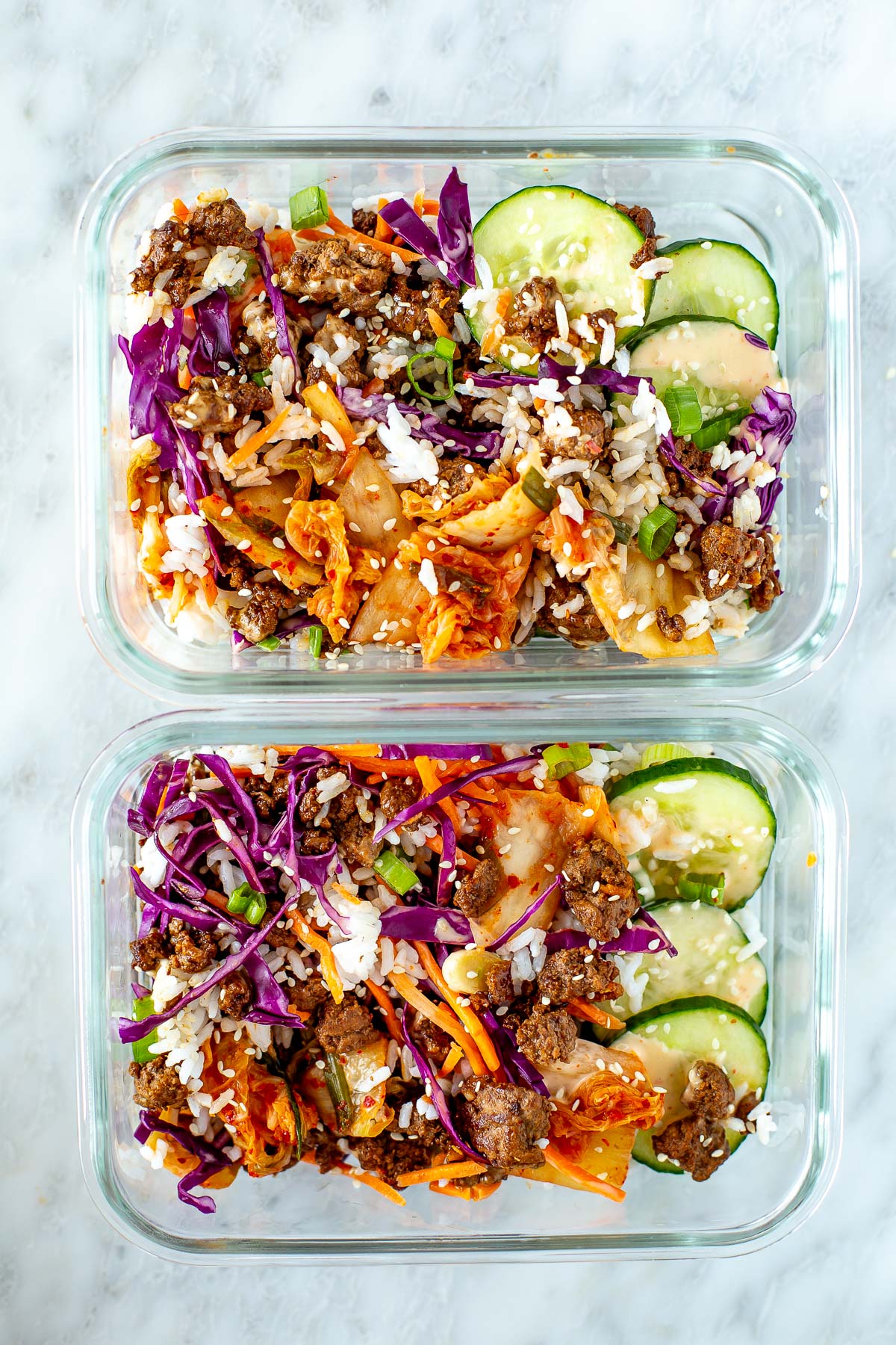 Overhead shot of two meal prep containers filled with Korean Beef Bowls.
