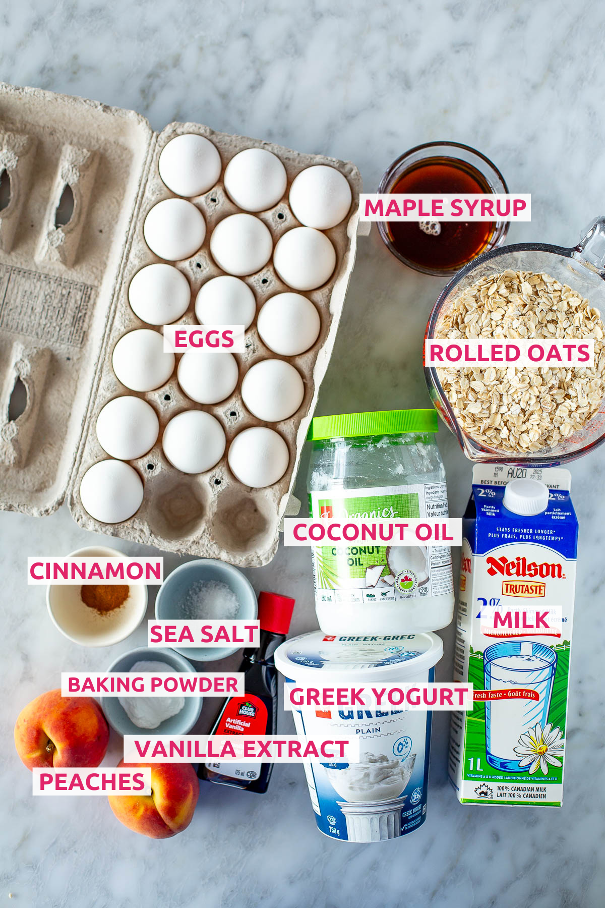 Overhead shot of all the ingredients for the High Protein Peach Baked Oatmeal recipe with labels.