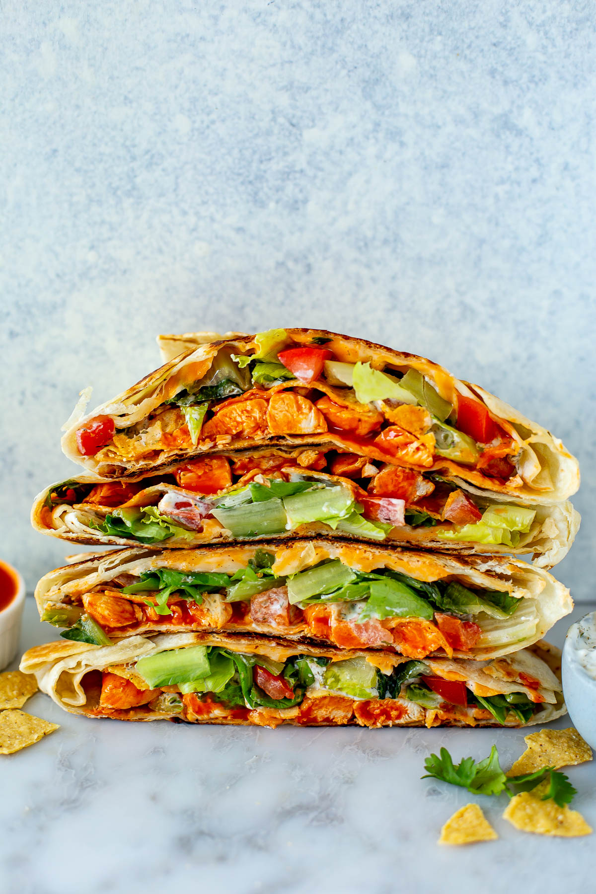 Side view stack of buffalo chicken crunchwraps