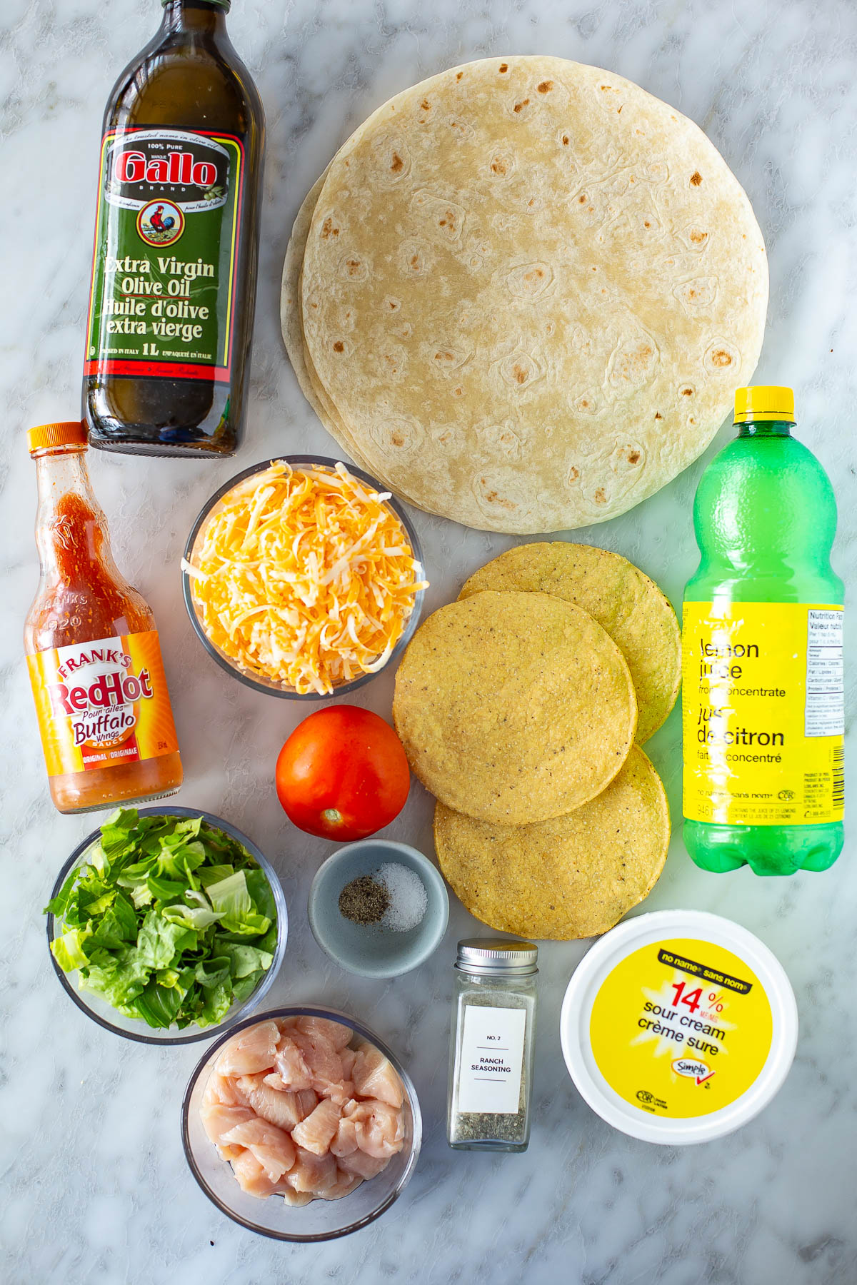 Overhead shot of ingredients for buffalo chicken crunchwrap