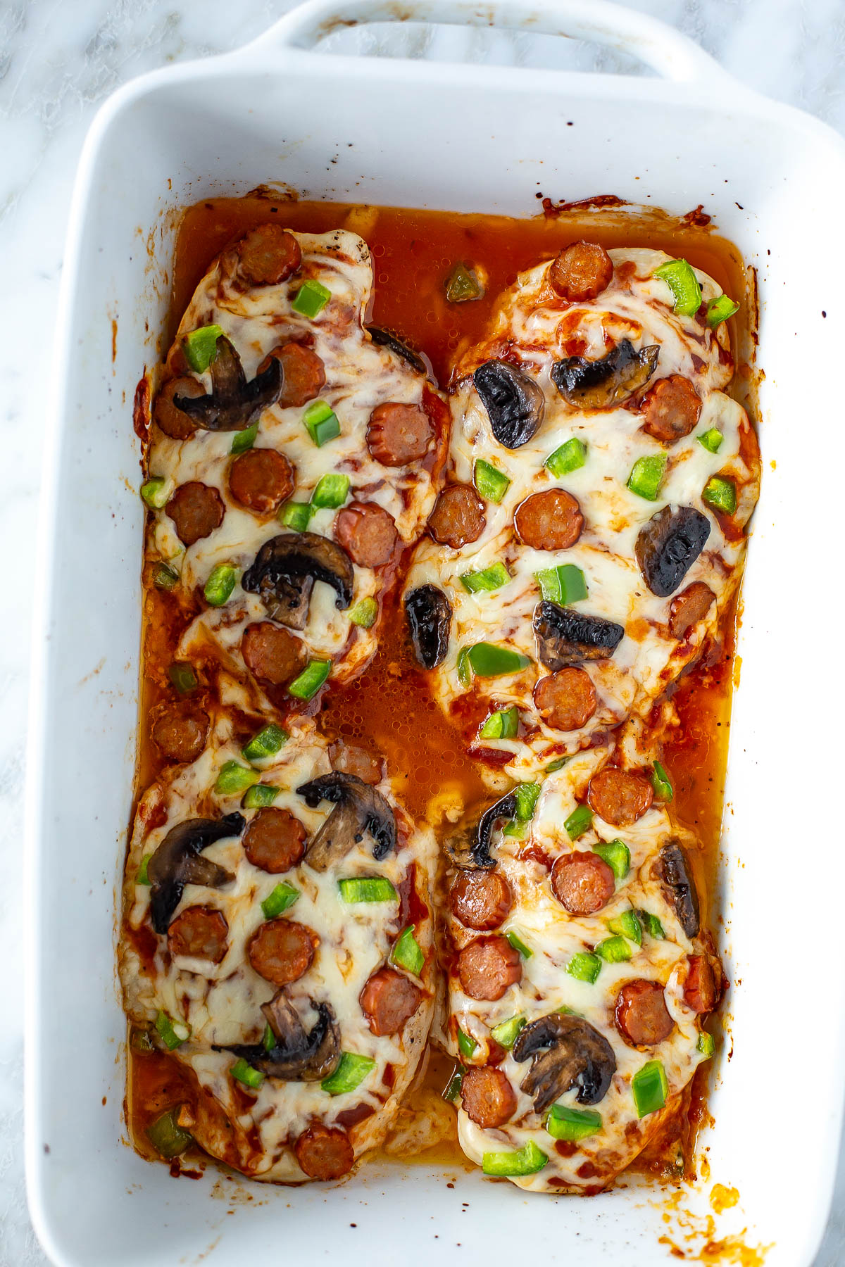 Cooked Pizza Chicken in baking dish