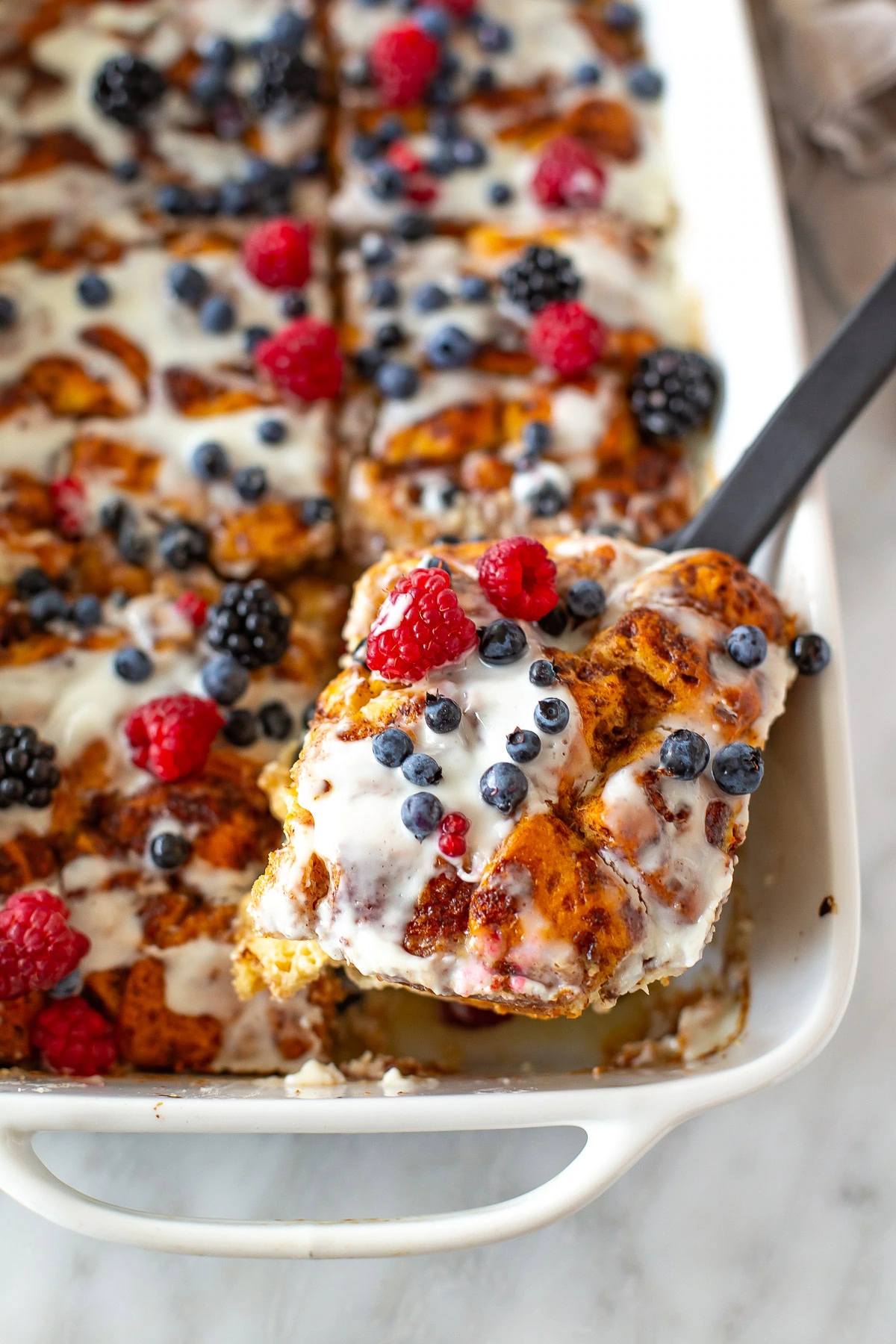 Cinnamon roll casserole scoop