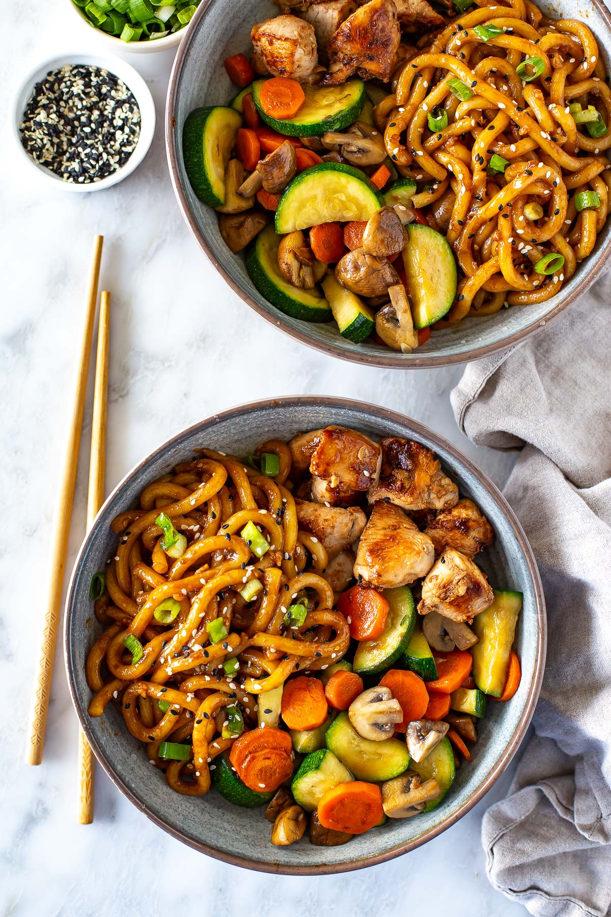 Overhead shot of plated hibachi noodles dish with chicken and vegetable